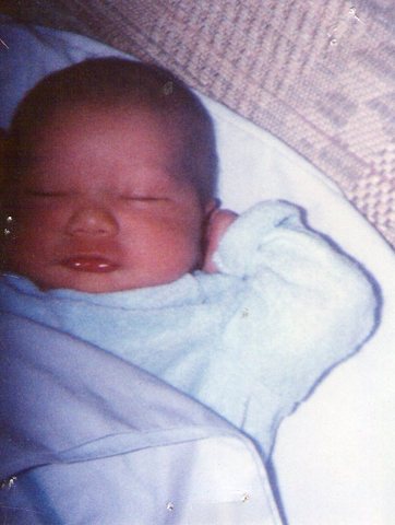 Mary and Rodney celebrate their son's birth.