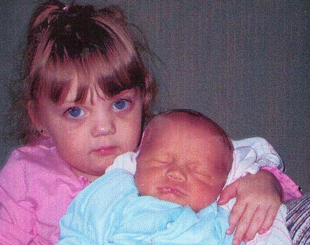 Kim and John Peak have a son, Joshua Douglas Peak.