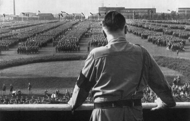 Hitler openly declares rearmament