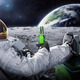 Moon drinking beer carlsberg space astronaut wallpapersbyte com 2560x1600