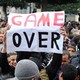 223889 a tunisian demonstrator holds a placard
