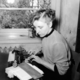 Woman at a braille typewriter