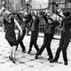 American woman teaching english boys to dance the charleston great britain 19251