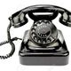 16128908 teléfono viejo rotativo sobre fondo blanco