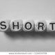 Word short spelled on dice 450w 1154533759