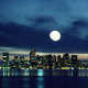 Allen russell boston skyline reflecting in harbor with full moon