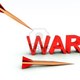 10836785 a conceptual image of the word war with a missile about to hit it