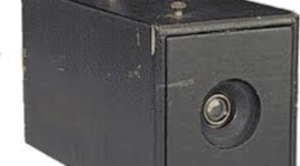 Timeline: A box camera, The first kodak for use by amateur photographers
