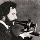 Alexander graham bell speaking into early telephone 1876