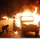 Cairo egypt riot police vehicle set on fire jan 2011 1