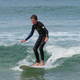 Greg surfing