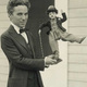 Charlie chaplin with doll