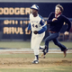 Hank aaron and friend collecting four bases with his 715th home run