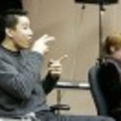 Timeline: sted on: Thu 17 Jun 2010, 12:18pmThis is a picture of two students interpreting sign language. They are also talking in sign language.