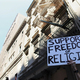 Protester in manhattan new york holds sign supporting religious freedom