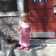 Amelie by the old house door