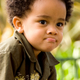 Black toddler pouting