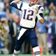Tom brady throwing a football