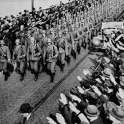 Timeline: 1936 hitler sends troops into Germany