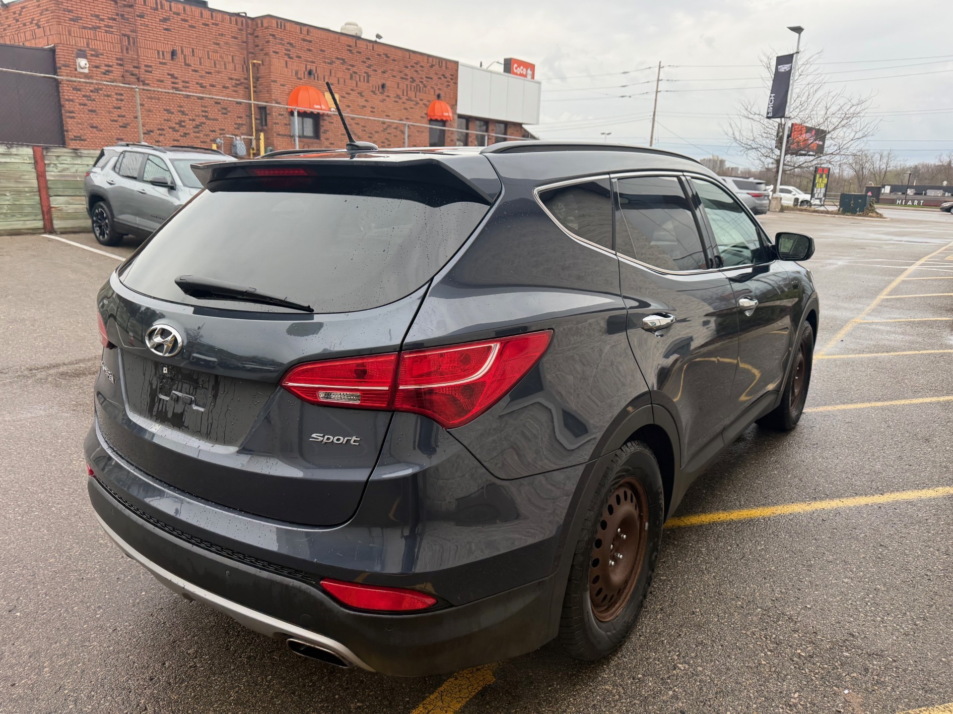 used 2014 Hyundai Santa Fe Sport car, priced at $5,800