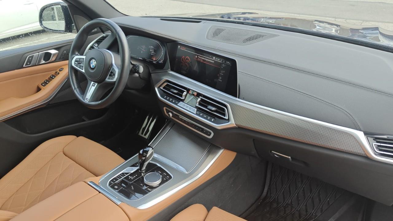 used 2023 BMW X5 car, priced at $64,600
