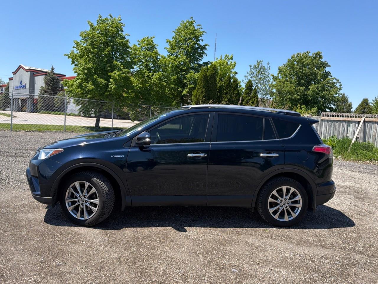 used 2018 Toyota RAV4 Hybrid car, priced at $28,597