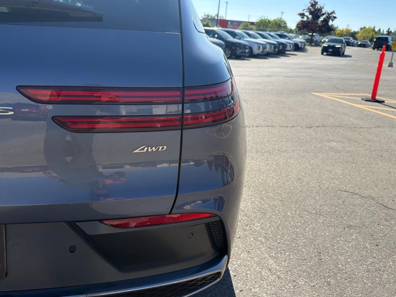 used 2026 Genesis GV70 car, priced at $69,597