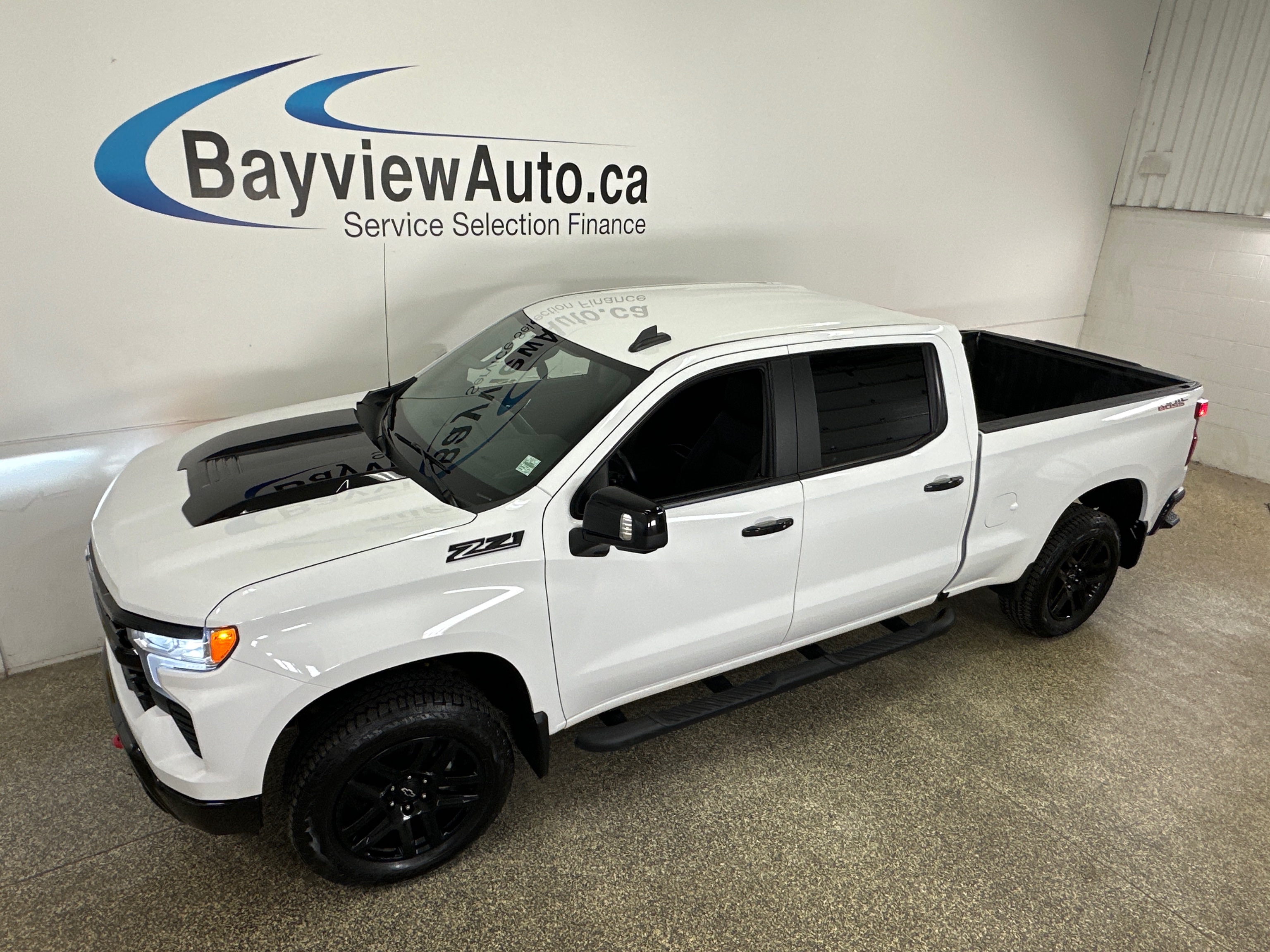 White 2024 Chevrolet Silverado 1500 LT Trail Boss Crew Cab 4WD Pickup Truck Four-Wheel Drive 8-Speed Automatic