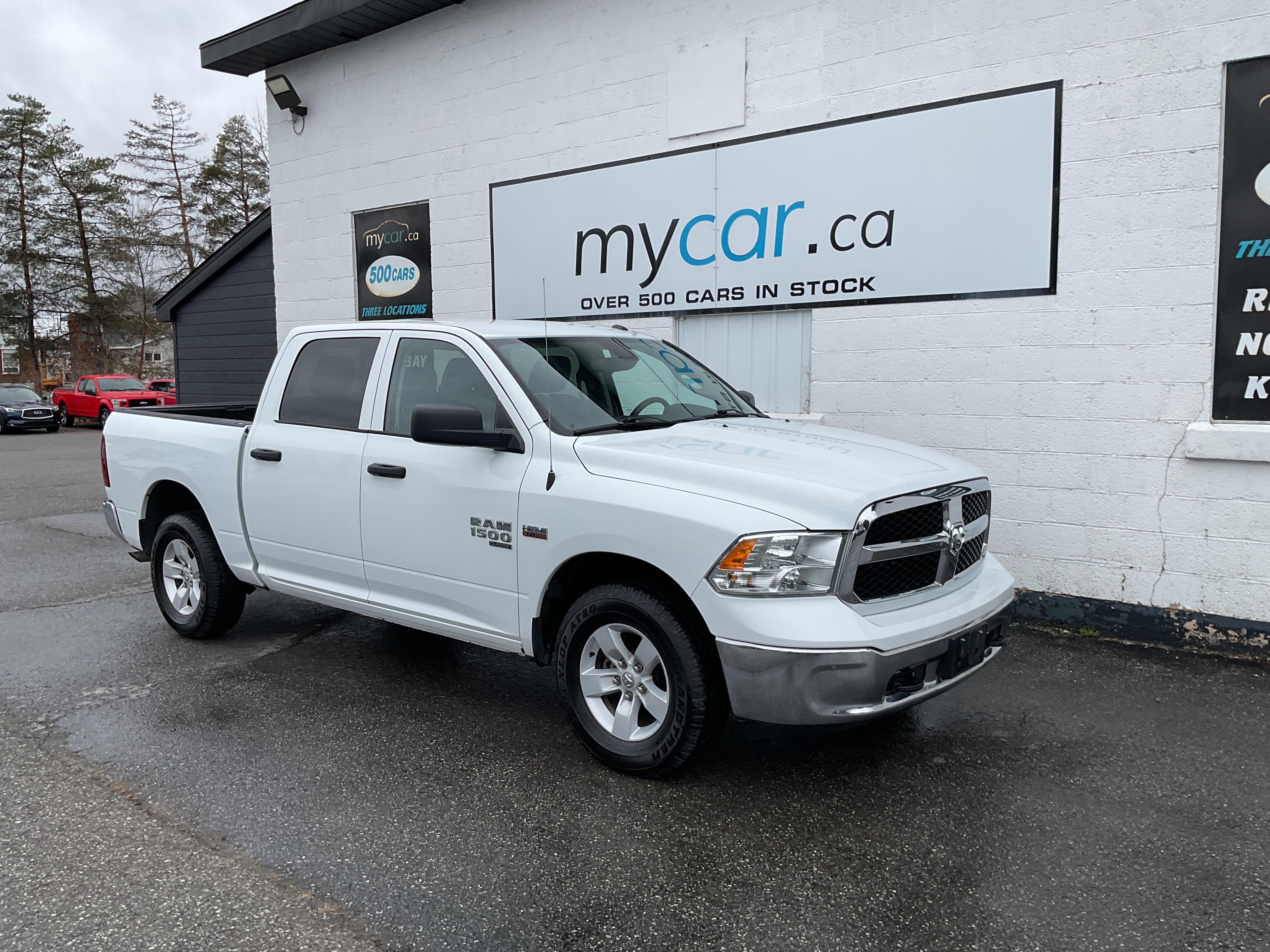 White 2023 RAM 1500 Classic SLT Crew Cab 4WD Pickup Truck Four-Wheel Drive 8-Speed Automatic