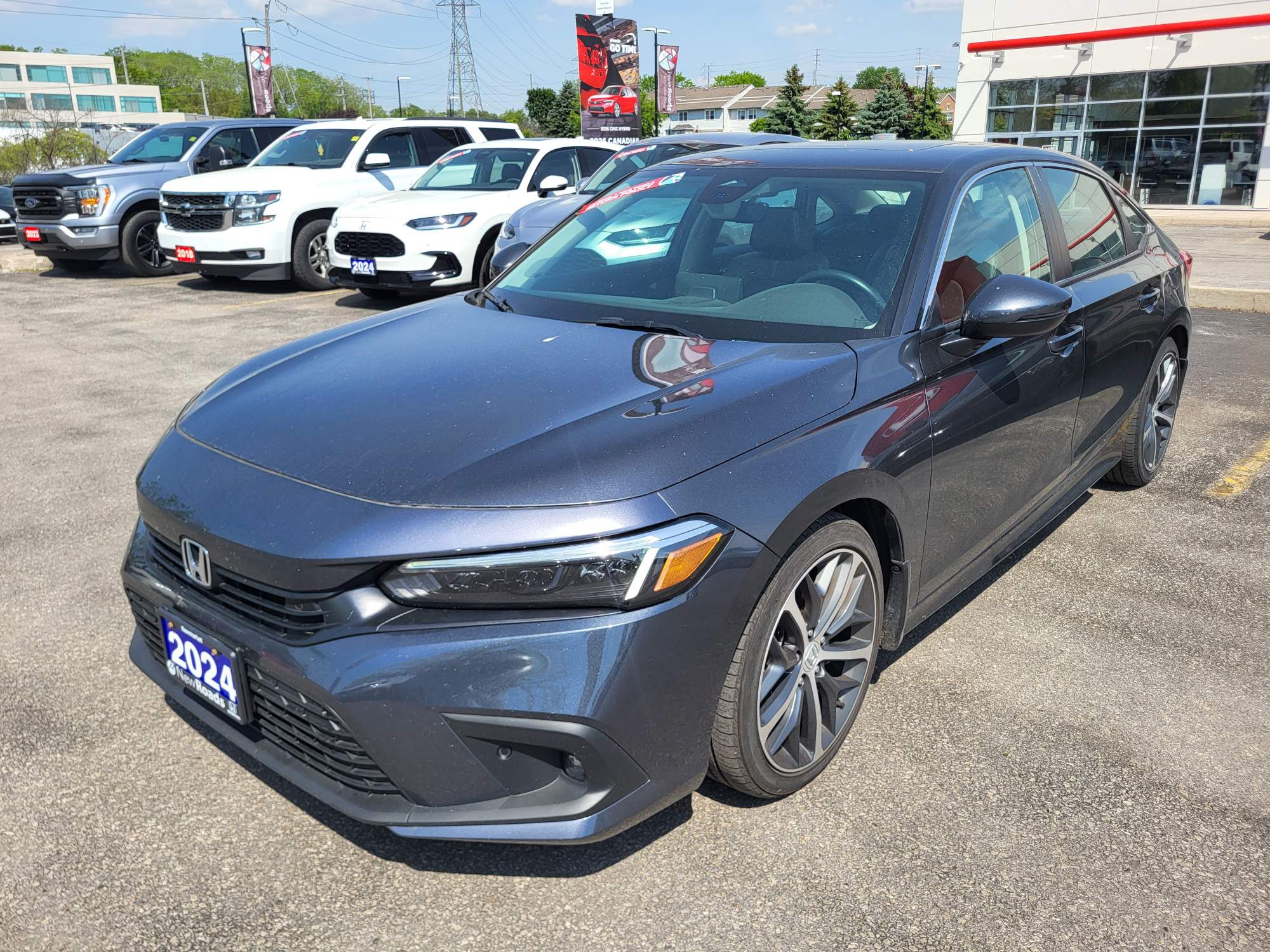 Gray 2024 Honda Civic Touring FWD Sedan Front-Wheel Drive Continuously Variable Transmission