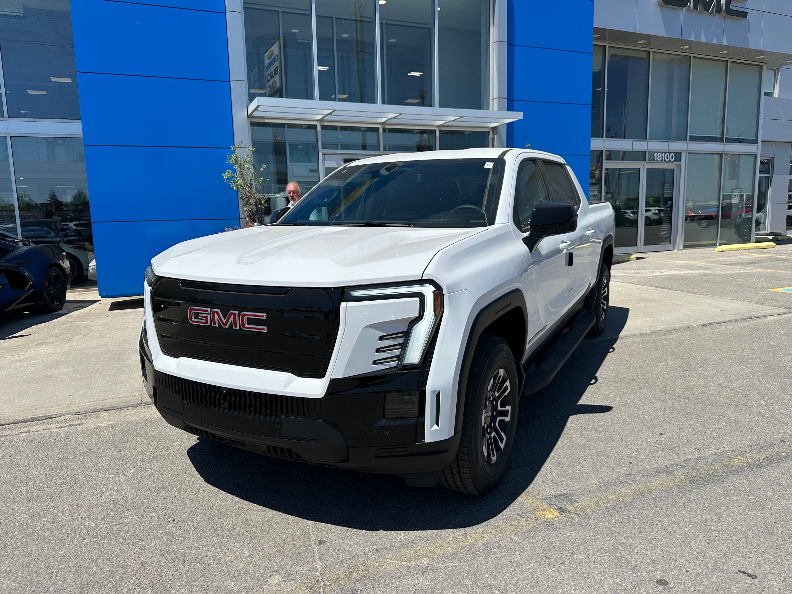 White 2026 GMC Sierra EV Elevation Crew Cab (Standard Range) e4WD Pickup Truck All-Wheel Drive 1-Speed Automatic