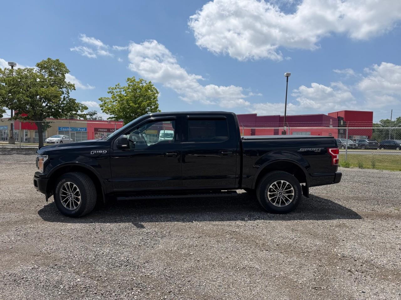 used 2018 Ford F-150 car, priced at $35,597
