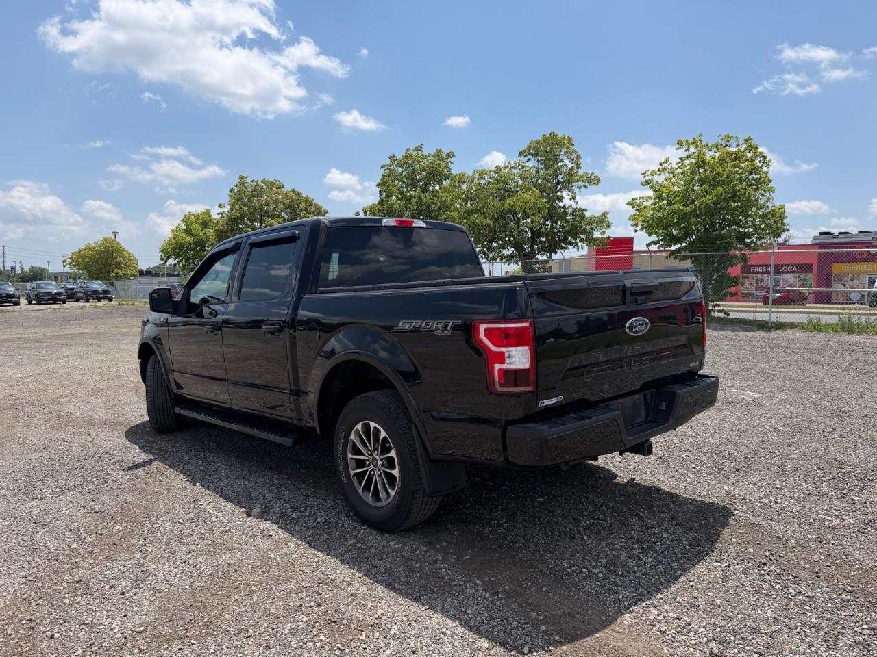 used 2018 Ford F-150 car, priced at $35,597