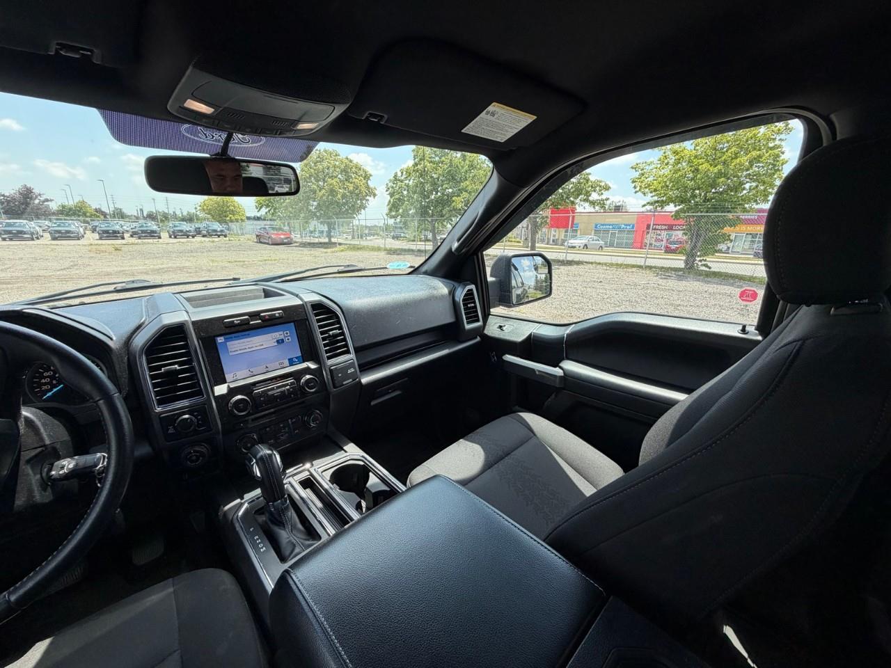 used 2018 Ford F-150 car, priced at $35,597