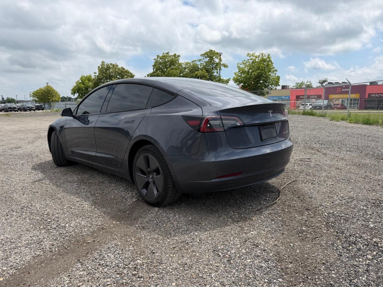 used 2023 Tesla Model 3 car, priced at $37,597