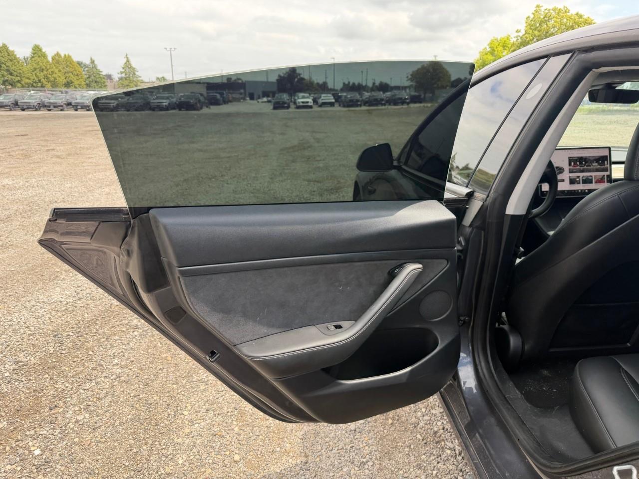 used 2023 Tesla Model 3 car, priced at $37,597