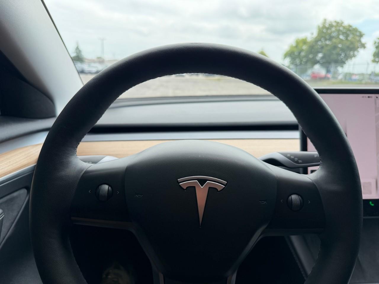 used 2023 Tesla Model 3 car, priced at $37,597