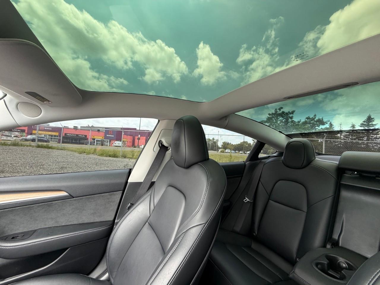 used 2023 Tesla Model 3 car, priced at $37,597