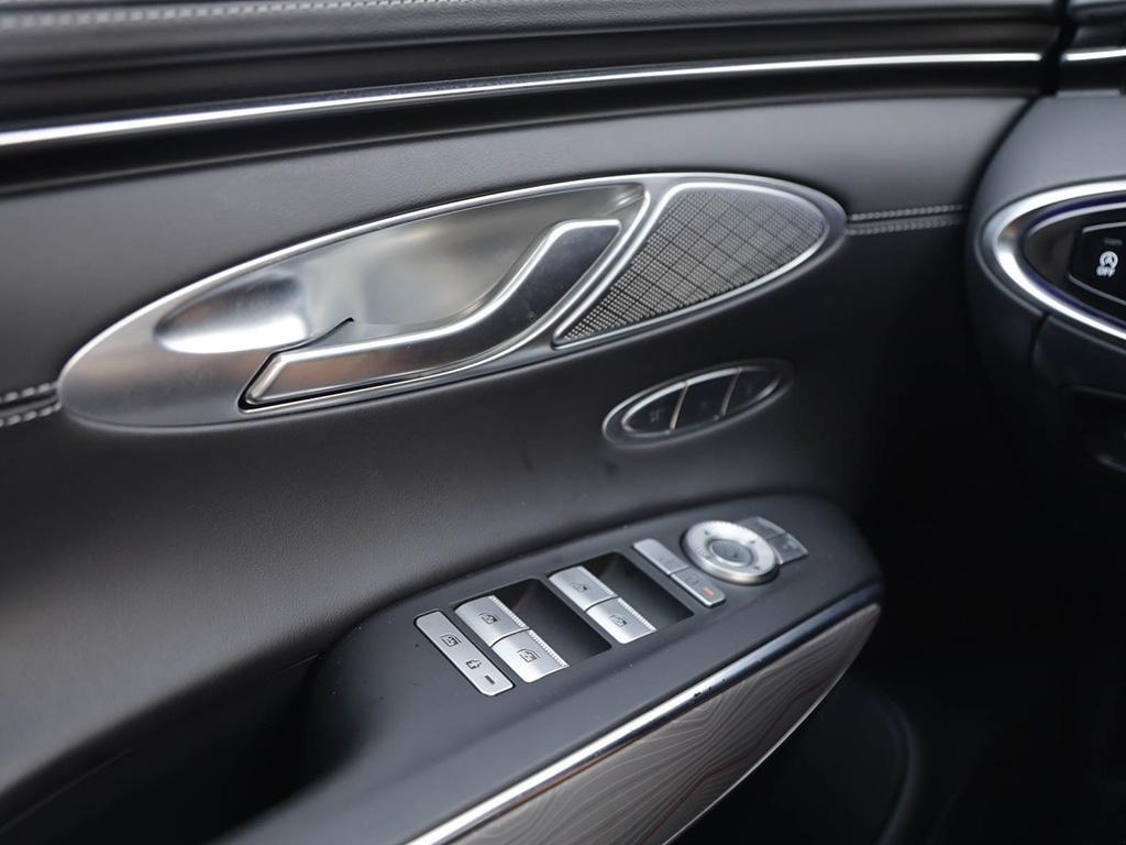 used 2022 Genesis GV70 car, priced at $35,097