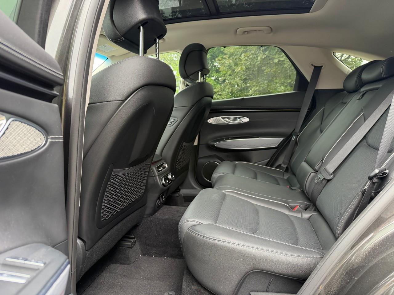 used 2023 Genesis GV70 car, priced at $43,587