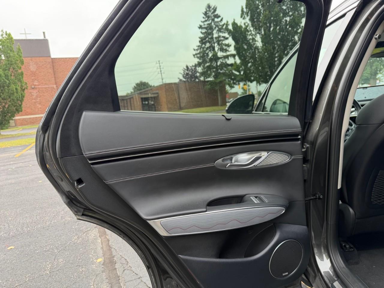 used 2023 Genesis GV70 car, priced at $43,587