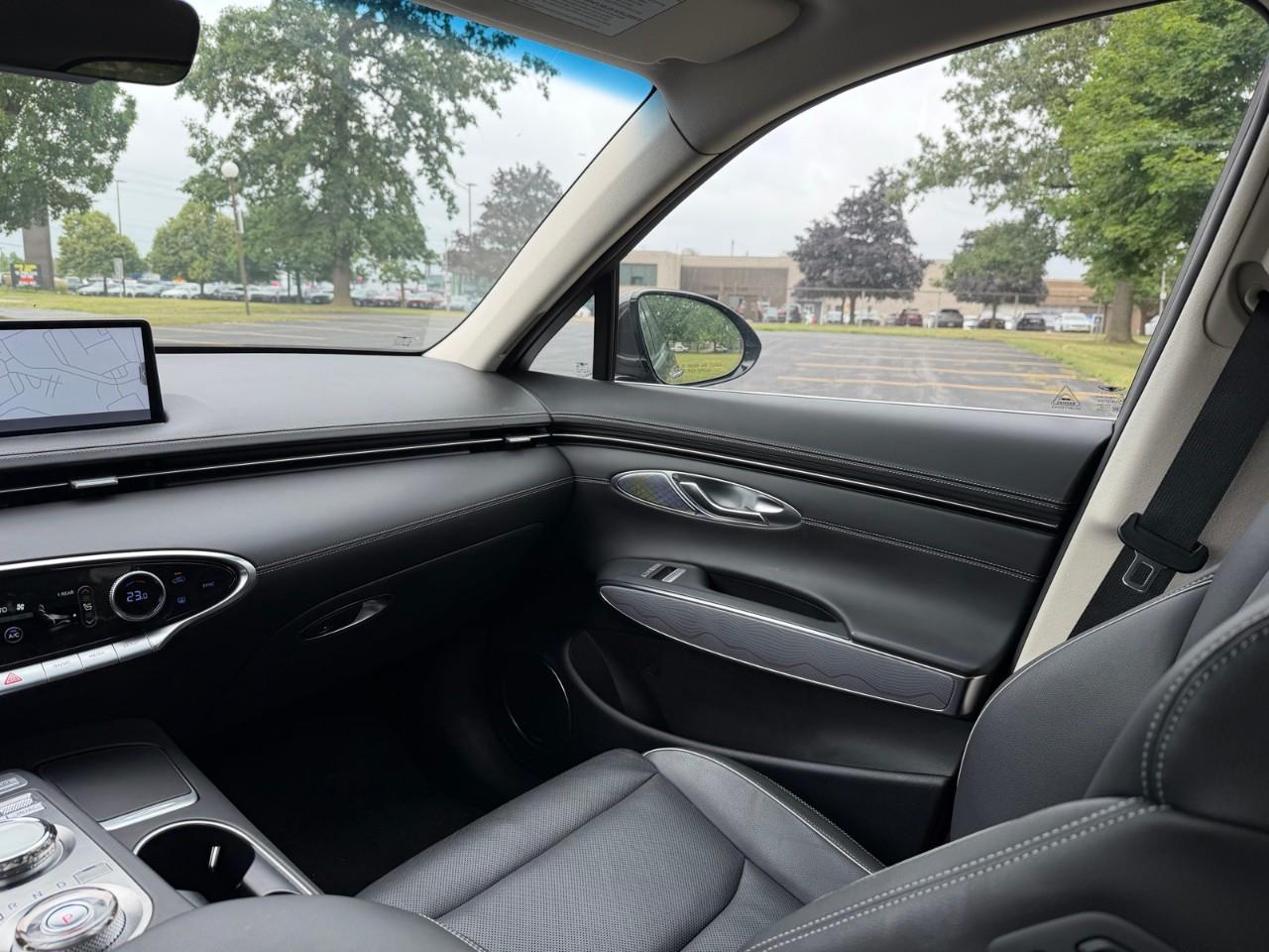 used 2023 Genesis GV70 car, priced at $43,587