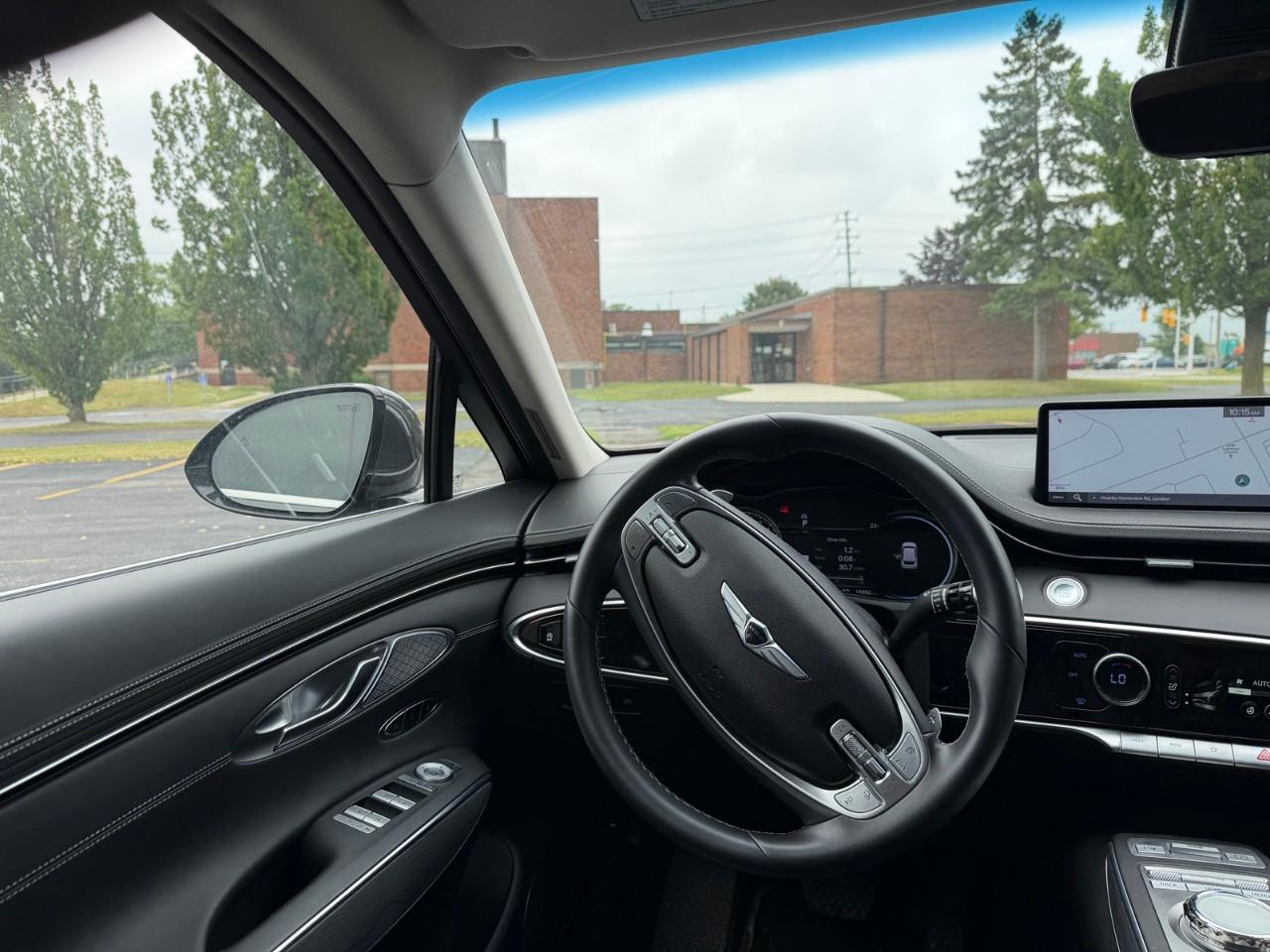 used 2023 Genesis GV70 car, priced at $43,587