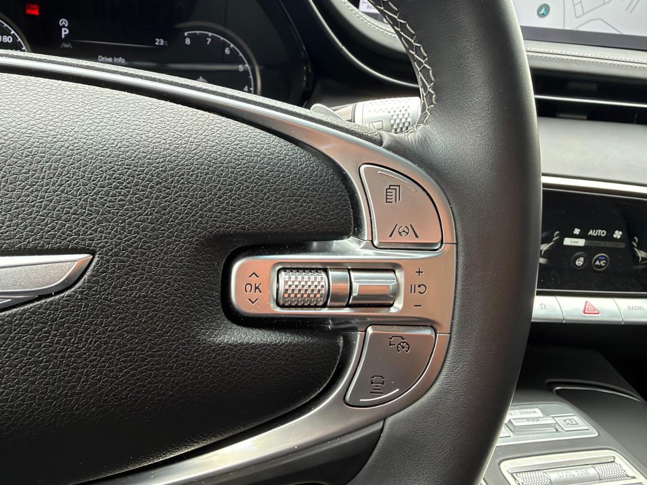 used 2023 Genesis GV70 car, priced at $43,587