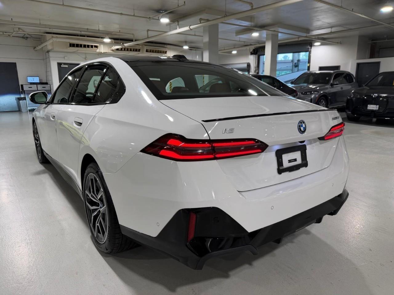 used 2025 BMW i5 car, priced at $79,922