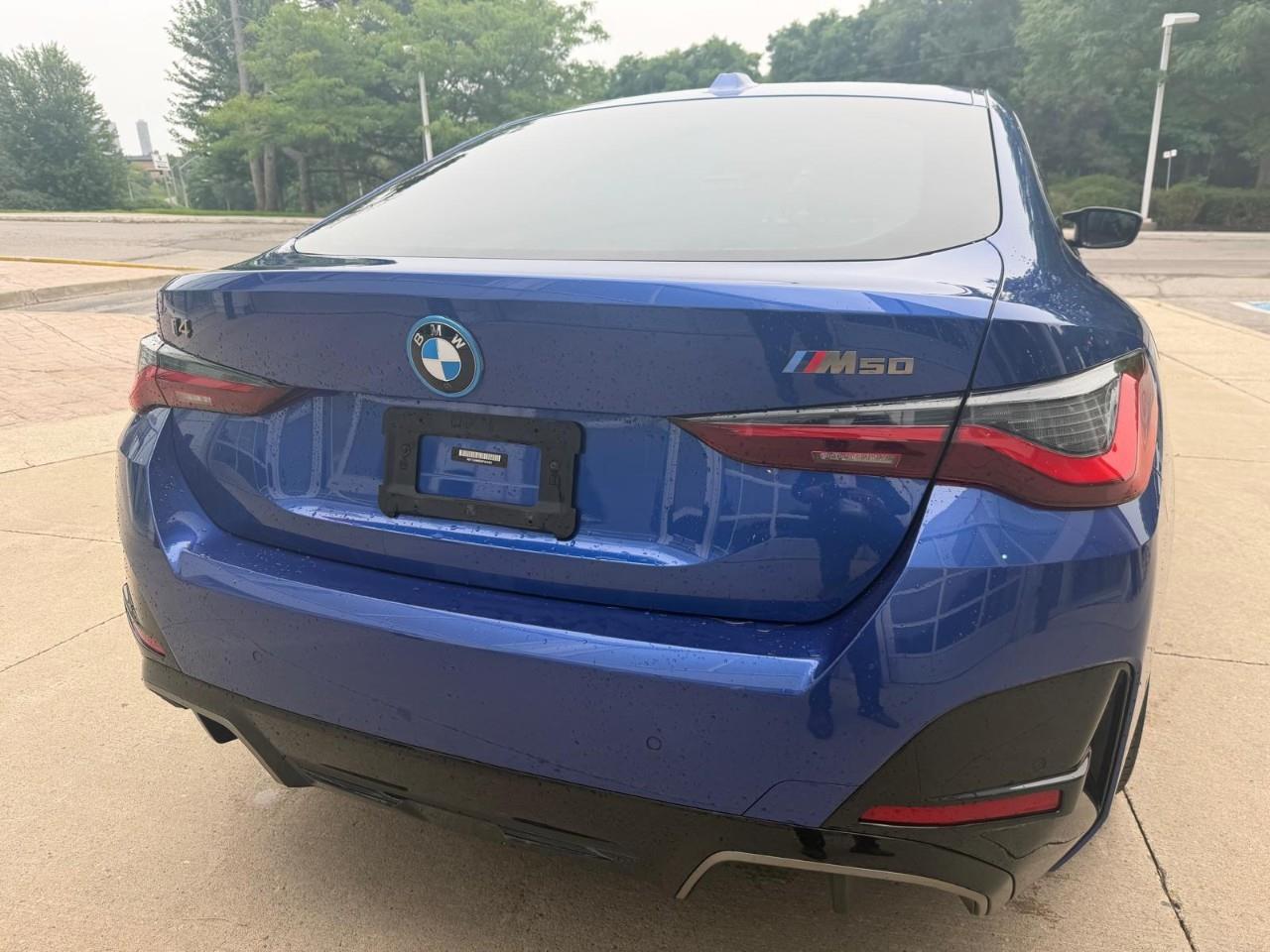 used 2022 BMW i4 car, priced at $55,488