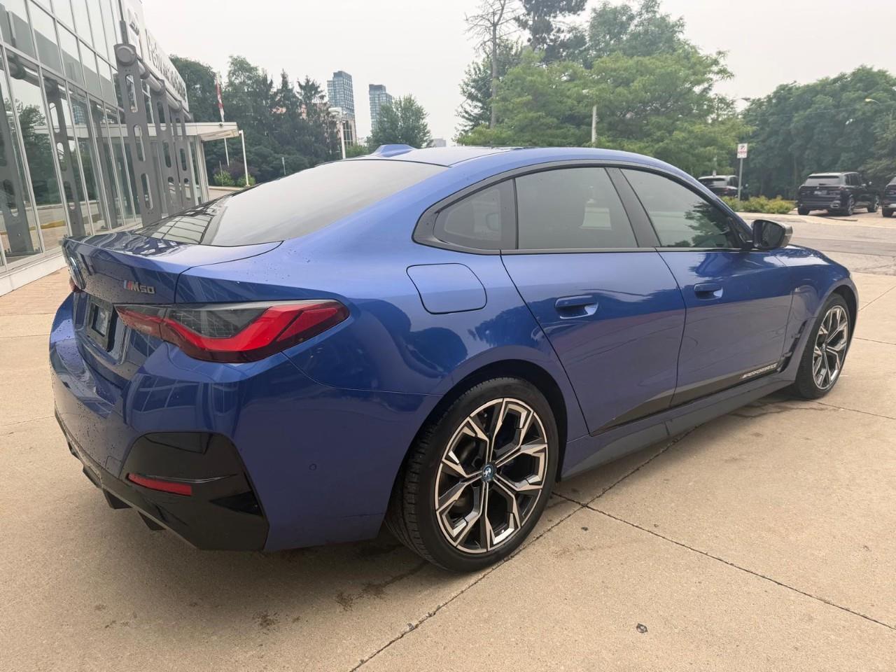 used 2022 BMW i4 car, priced at $55,488