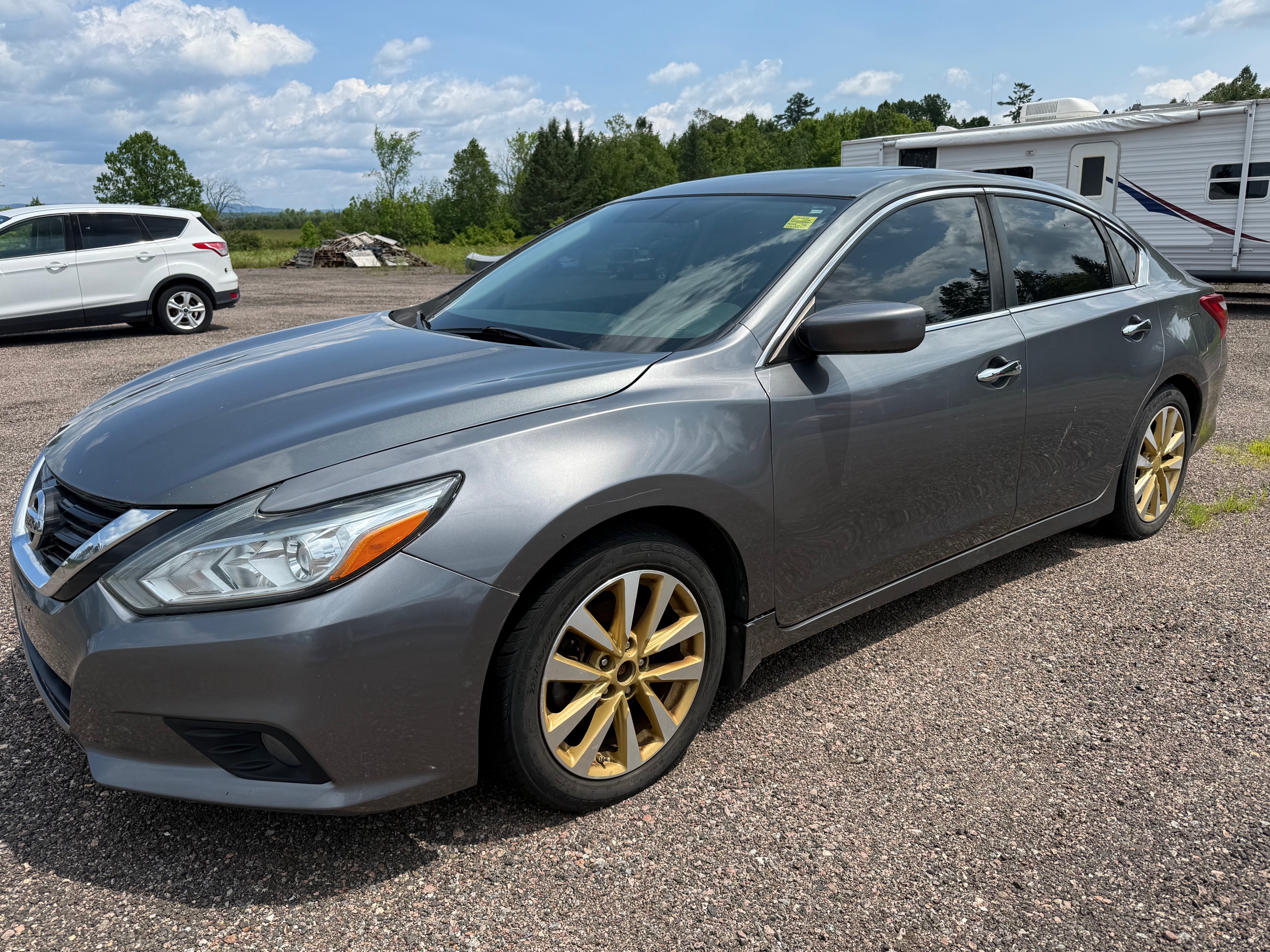 Gray 2017 Nissan Altima Sedan Front-Wheel Drive Continuously Variable Transmission