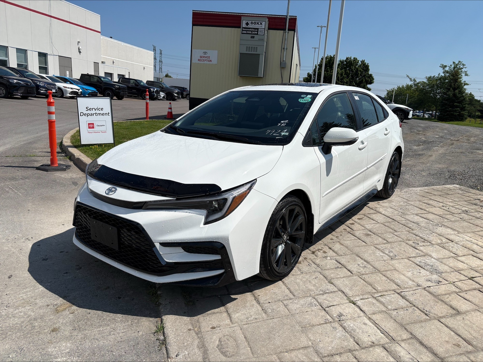 White 2026 Toyota Corolla Hybrid Sedan All-Wheel Drive Continuously Variable Transmission
