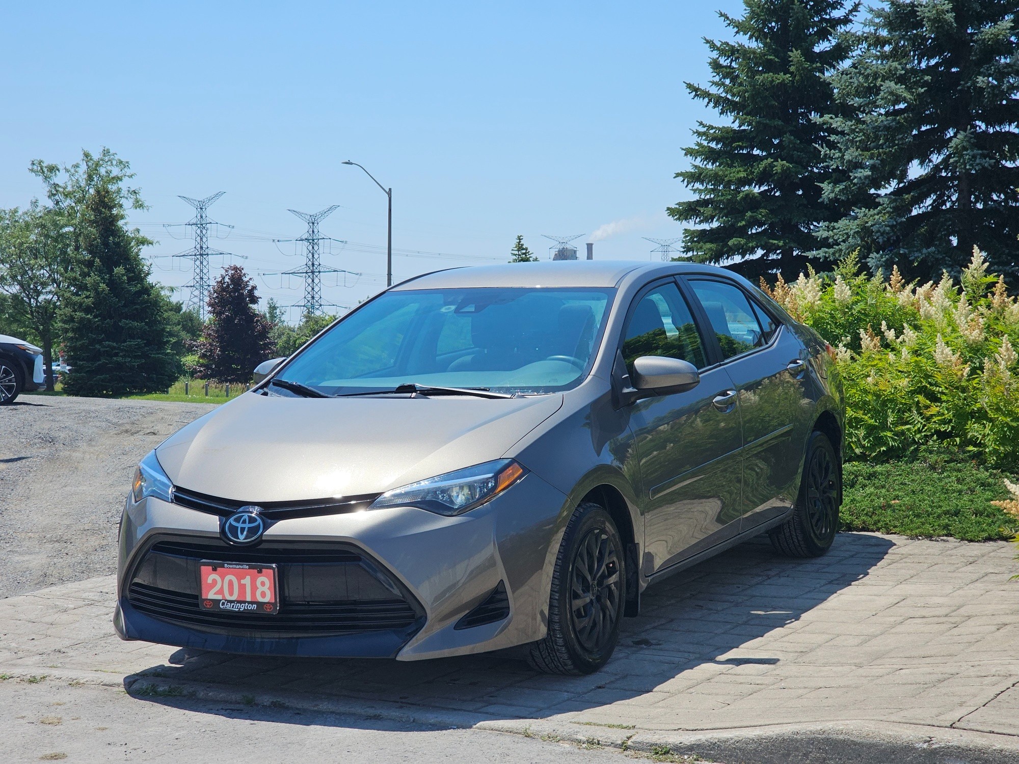 Brown 2018 Toyota Corolla Sedan Front-Wheel Drive Continuously Variable Transmission